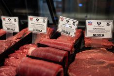 Four different cuts of beef are pictured on display at a butcher shop at Reading Terminal Market in Philadelphia, Pennsylvania.