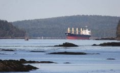A grain ship navigates the waters near Prince Rupert, British Columbia.