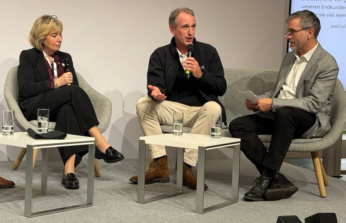 Donna Boyd, CEO of the Agricultural Manufacturers of Canada and R&eacute;gis Legendre, owner of Lucas G were on a pane at Agritechnical, moderated by Guido Honer, of Landwirtschaftsverlag.