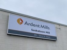 A sign on the side of a building that reads, "Ardent Mills Saskatoon Mill."