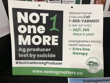 A ;poster highlighting a newly-released suicide prevention program for farmers entitled, "Not One More."