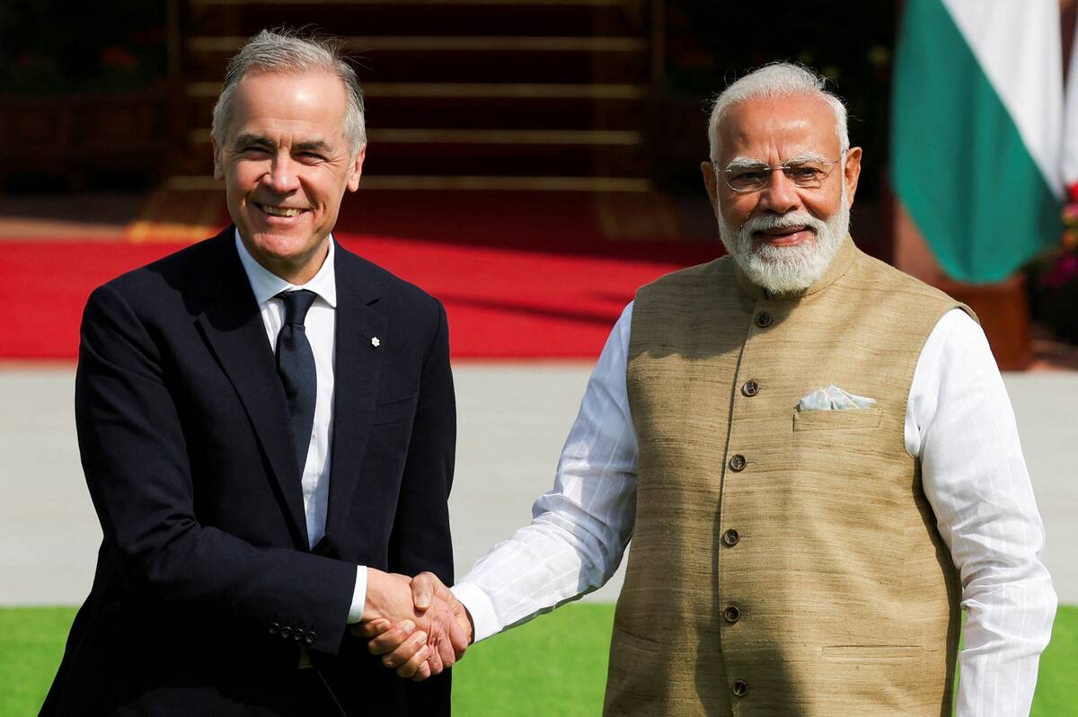 Canada&rsquo;s Prime Minister Mark Carney walks with his Indian counterpart, Narendra Modi, before their meeting at Hyderabad House in New Delhi, India, March 2, 2026. Photo: REUTERS/Adnan Abidi
