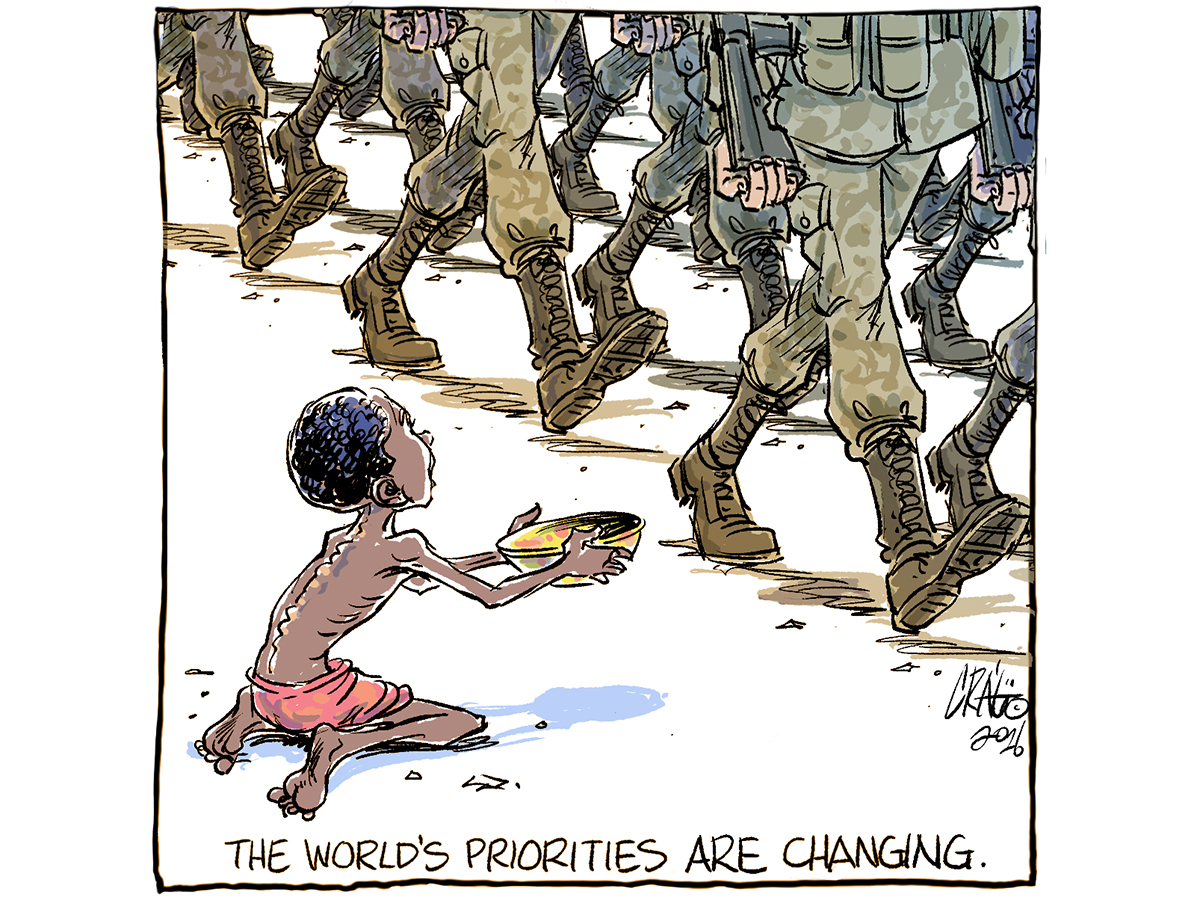 An editorial cartoon showing a child on his knees holding an empty bowl out as just the legs and boots of soldiers are visible as they march by.