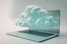 A graphic of a cloud overtop a laptop computer depicting "cloud accounting."