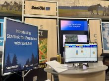 A photo of the SaskTel booth at Canada's Farm Show in Regina recently, highlighting a sign that reads, "Introducing Starlink for Business with SaskTel!"