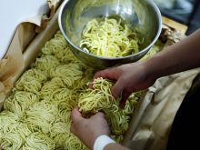 Ramen shop Menya Taisei's owner Taisei Hikage prepares to cook ramen with noodles at his shop in Tokyo, Japan, October 22, 2024. REUTERS/Kim Kyung-Hoon