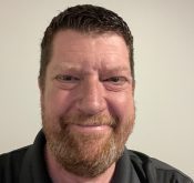 A mugshot of Western Producer reporter Greg Price.