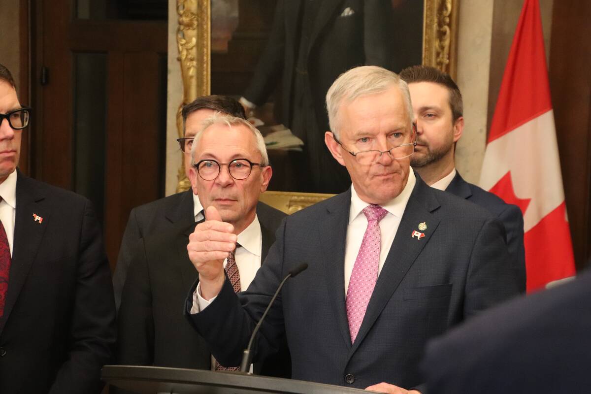 MP David Bexte speaks with reporters in Ottawa on April 15.